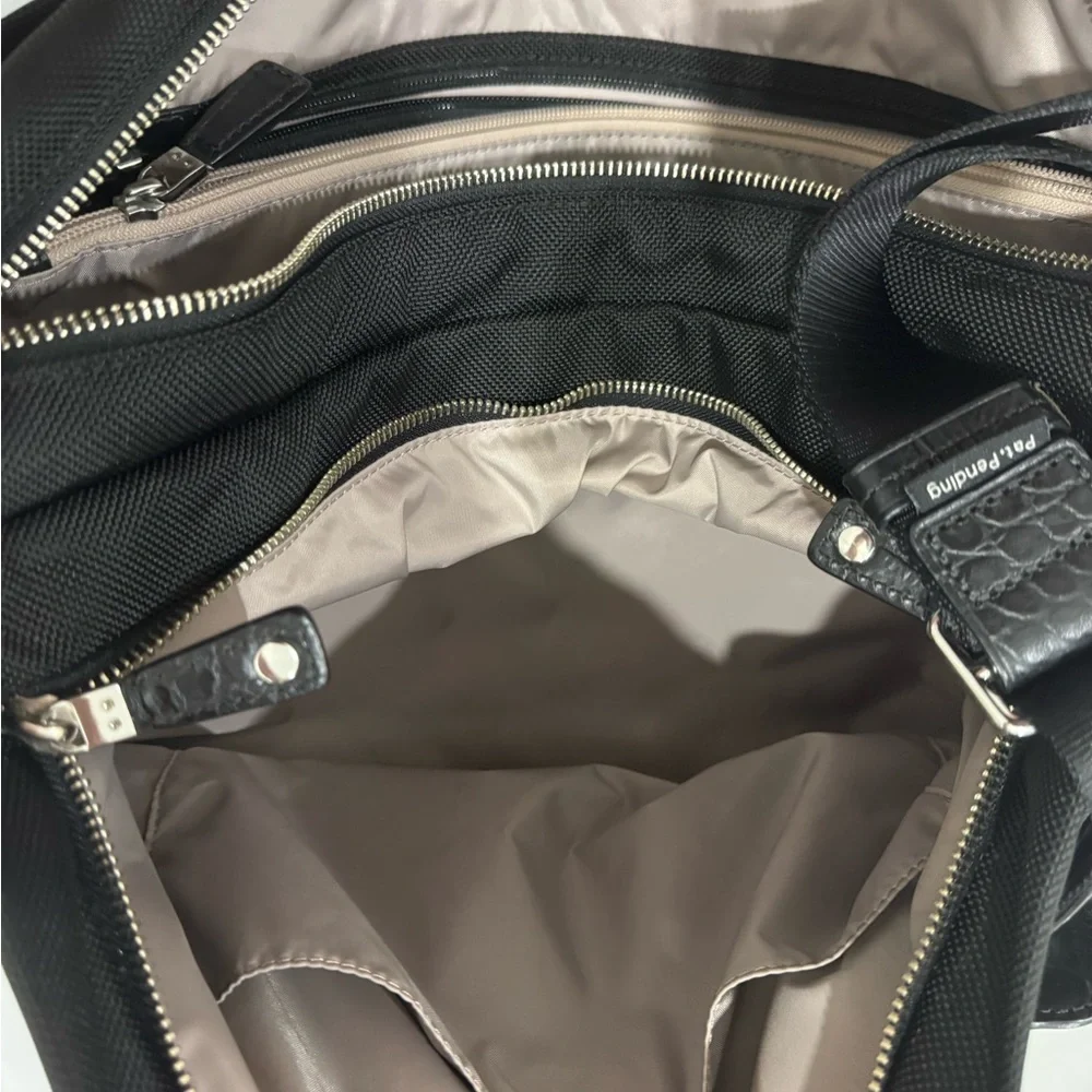Tumi Travel Black Briefcase with Leather Finish and Metal Accents